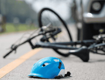 blue bike helmet on road