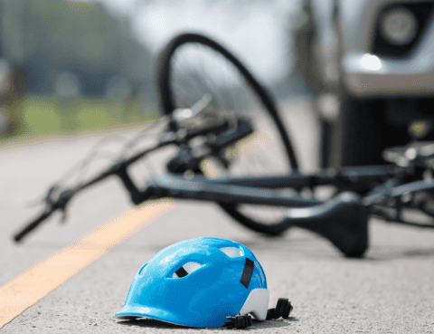 blue bike helmet on road