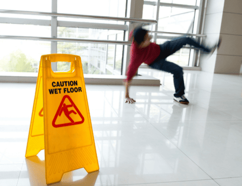 person slipping on wet floor