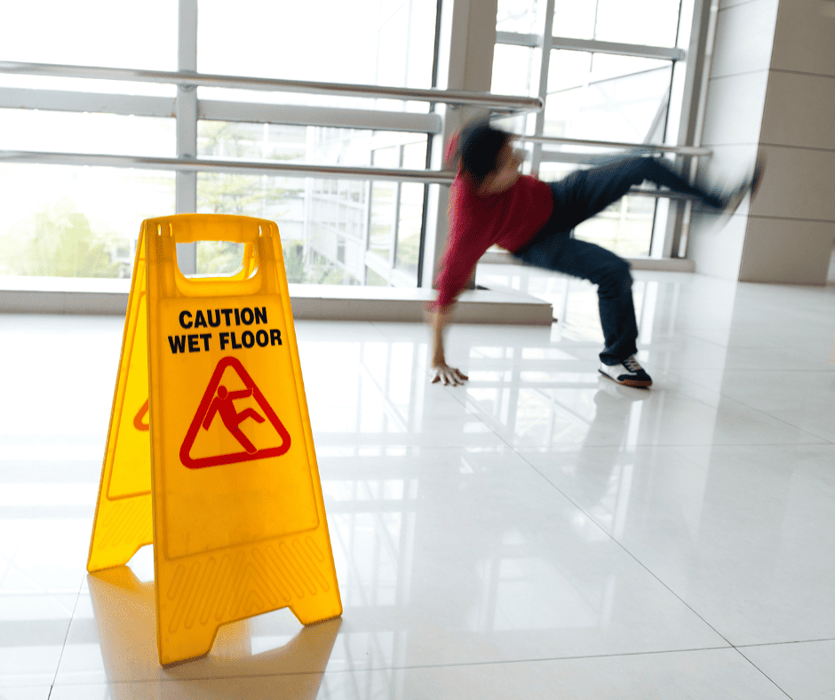 person slipping on wet floor