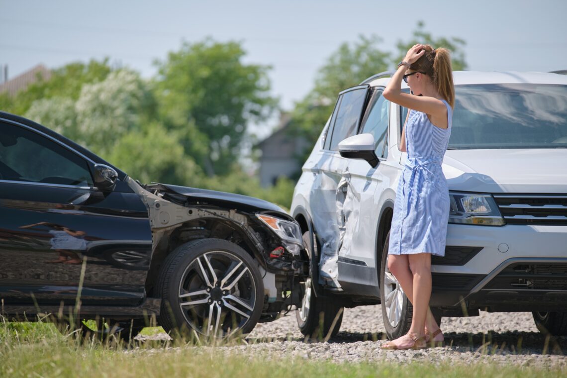 a woman who knows what MedPay in atlanta is because she is on the phone at the scene of a wreck with a member of Burrow & Associates