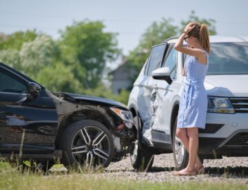 a woman who knows what MedPay in atlanta is because she is on the phone at the scene of a wreck with a member of Burrow & Associates